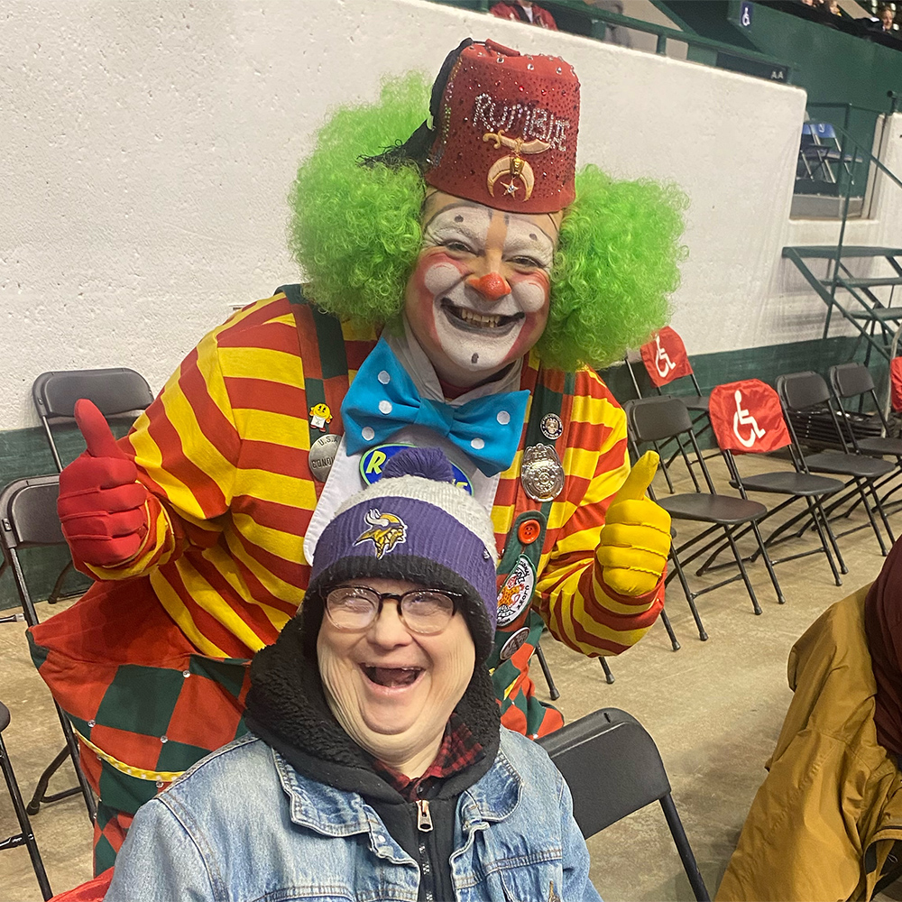 happy clown and man